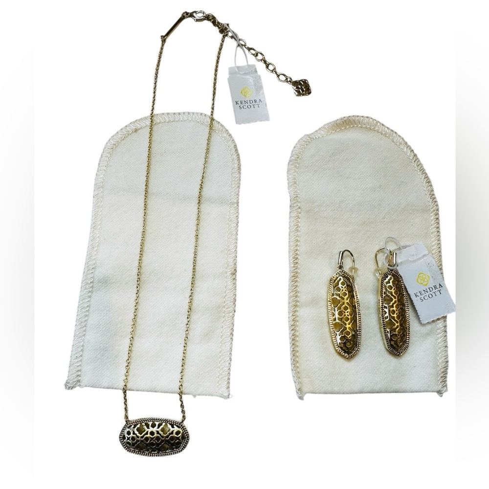 Kendra Scott necklace earrings set. Never worn. Gold design. Beautiful gift.
